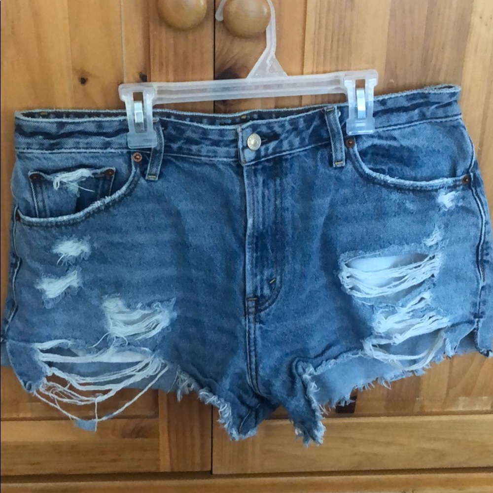 Distressed denim shorts